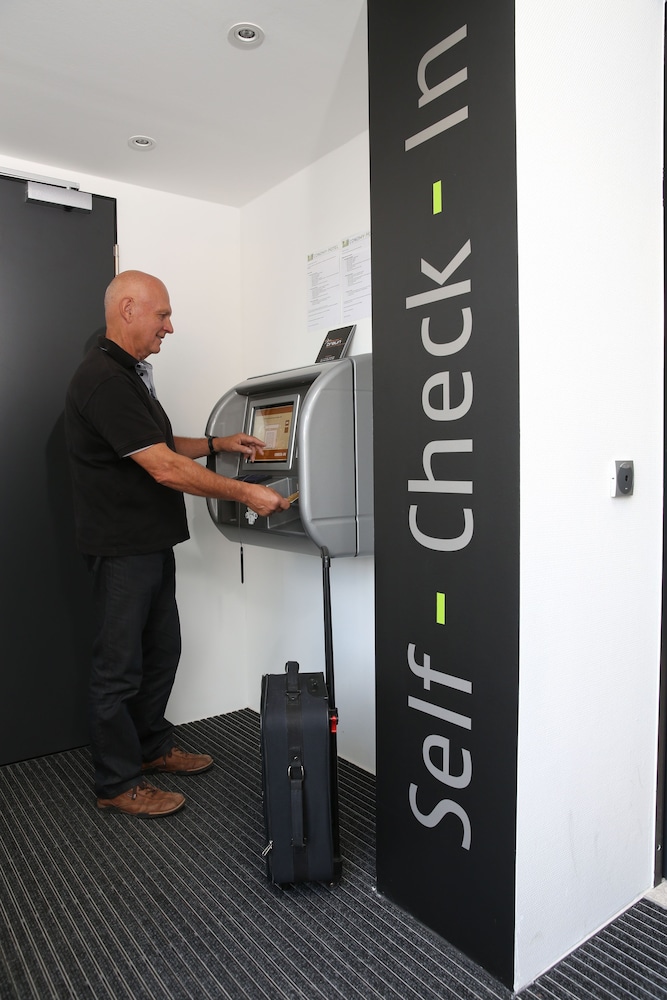 Check-in/check-out kiosk
