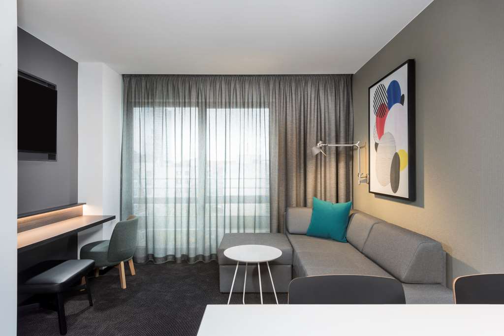 adina apartment hotel leipzig one bedroom lounge room