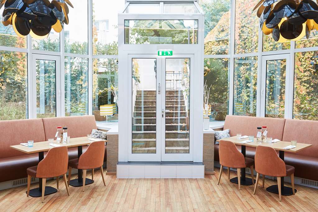 scandic berlin kurfuerstendamm restaurant wintergarden view door stairs