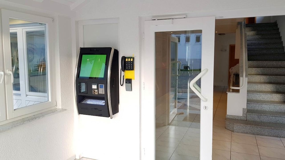 Check-in/check-out kiosk