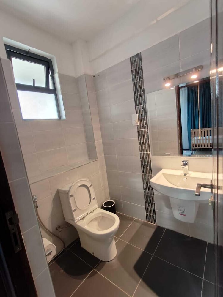 Raised toilet seat