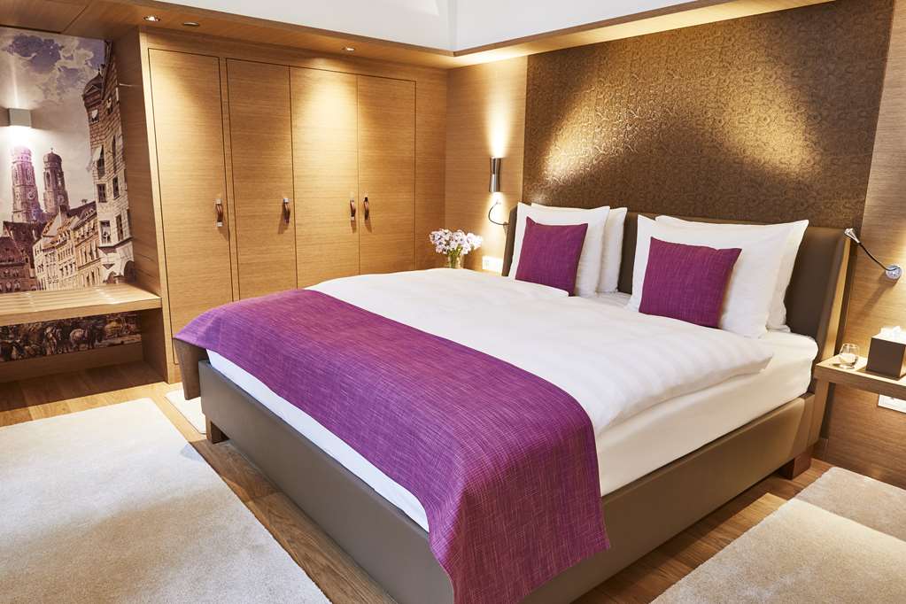 MUC1_Superior Suite bedroom.jpg