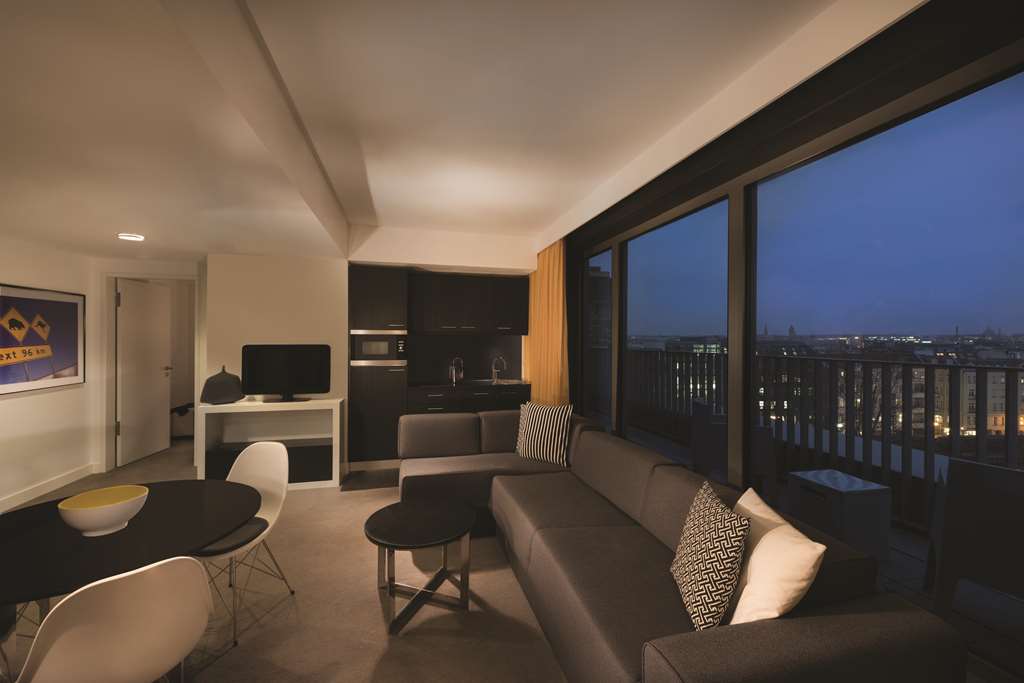 adina apartment hotel hackescher markt one bedroom premier apartment lounge room with balcony