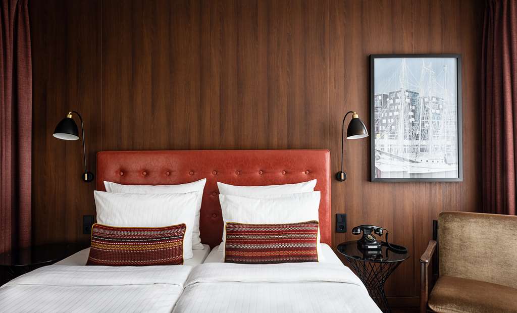ameron speicherstadt zimmer standard hafencity bett frontal sessel bild quer