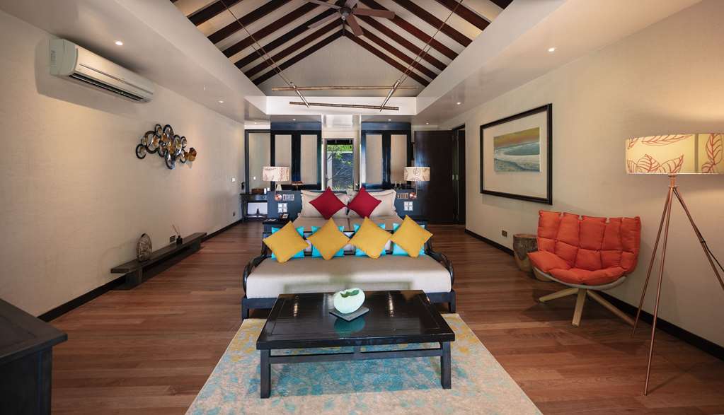 ATMOSPHERE KANIFUSHI MALDIVES VILLAS TWO BEDROOM SUNSET FAMILY BEACH VILLA PRIMARY