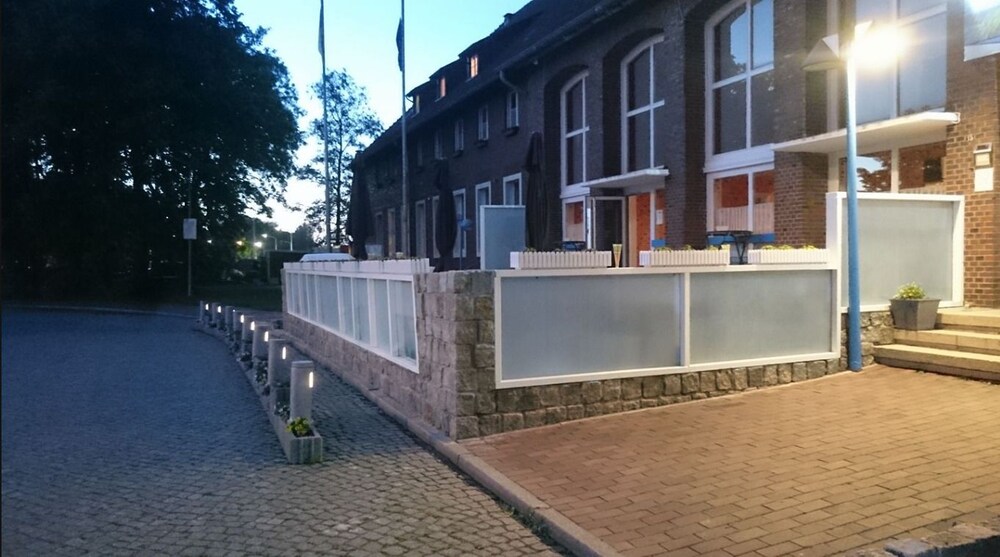 Hotel Front - Evening/Night