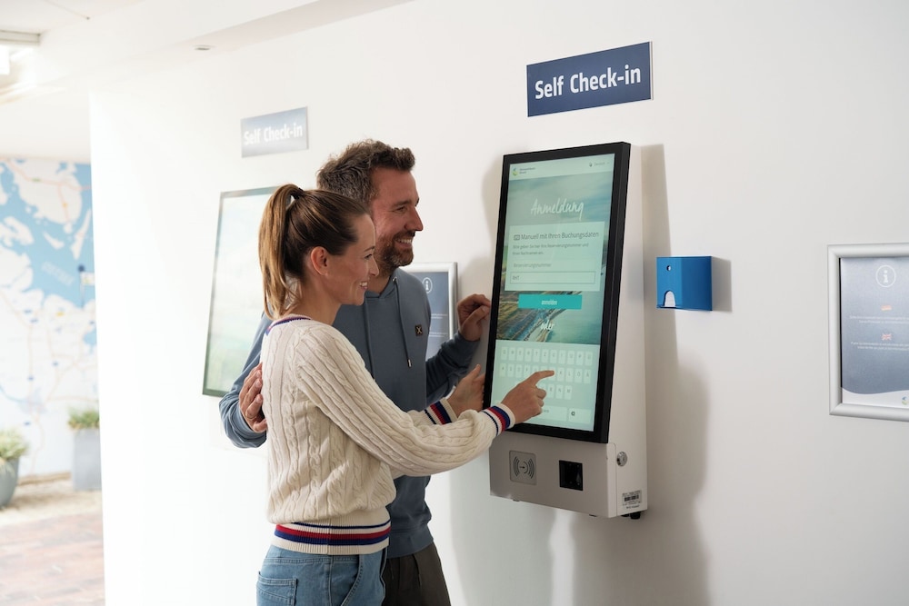 Check-in/check-out kiosk