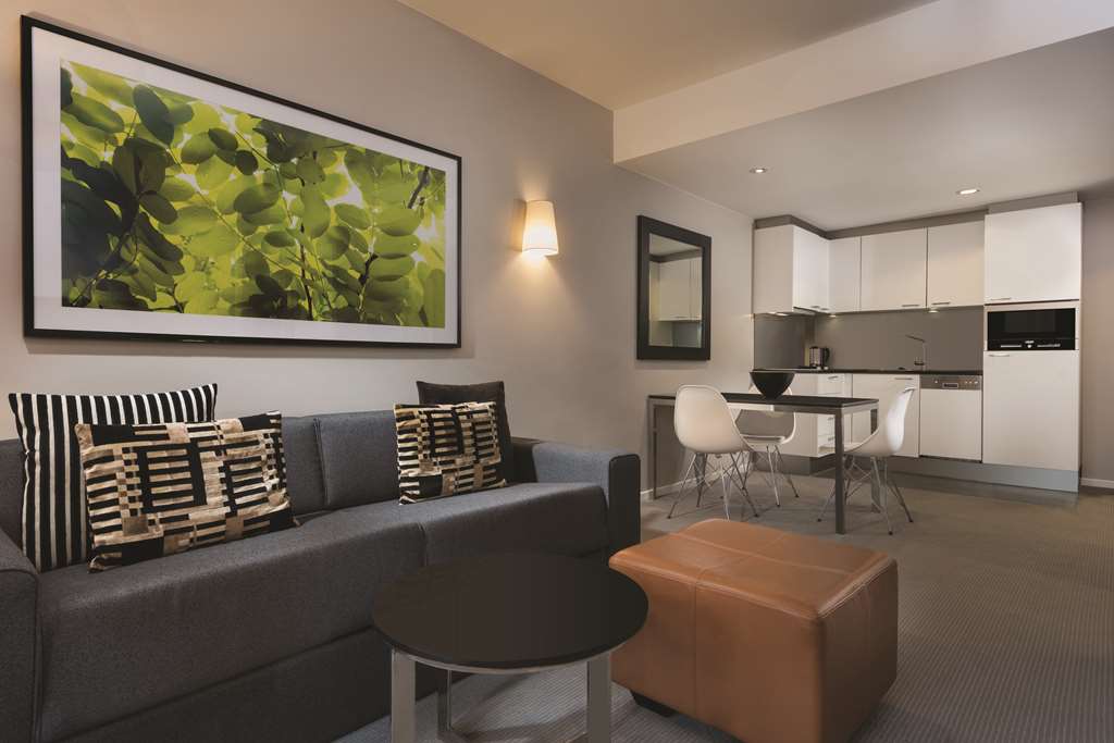 adina apartment hotel berlin mitte one bedroom apartment kitchen and lounge room