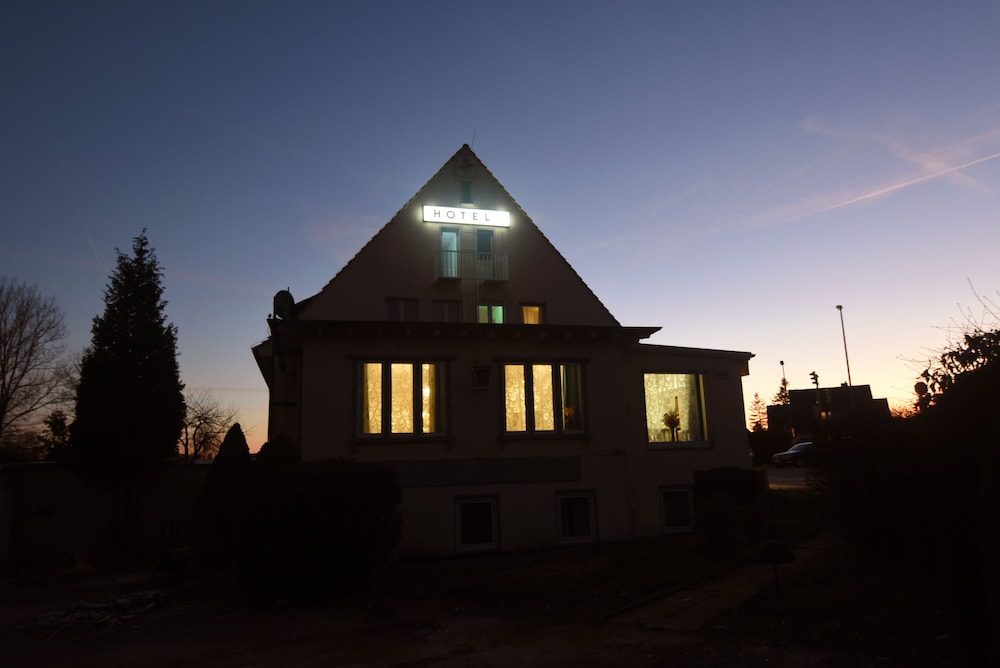 Hotel Front - Evening/Night