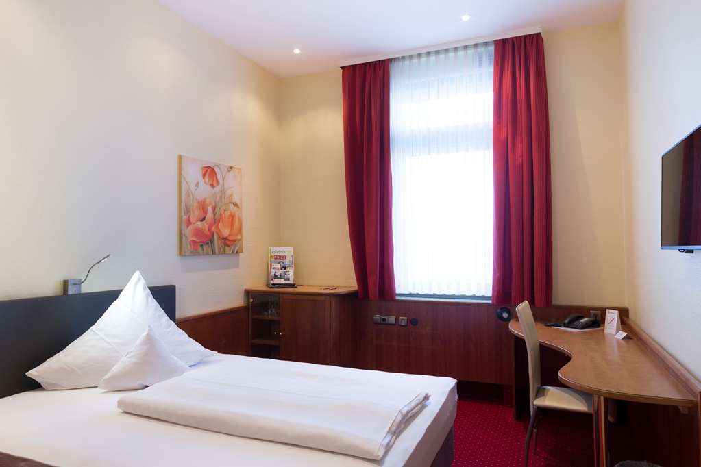 French bed room TOP Hotel Amberger Wuerzburg