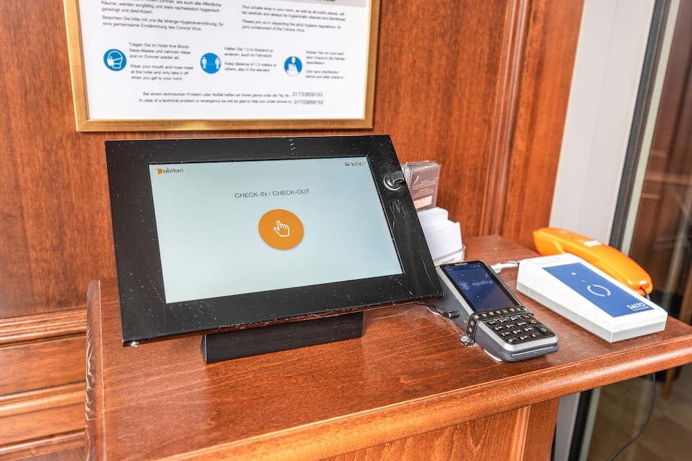Check-in/check-out kiosk