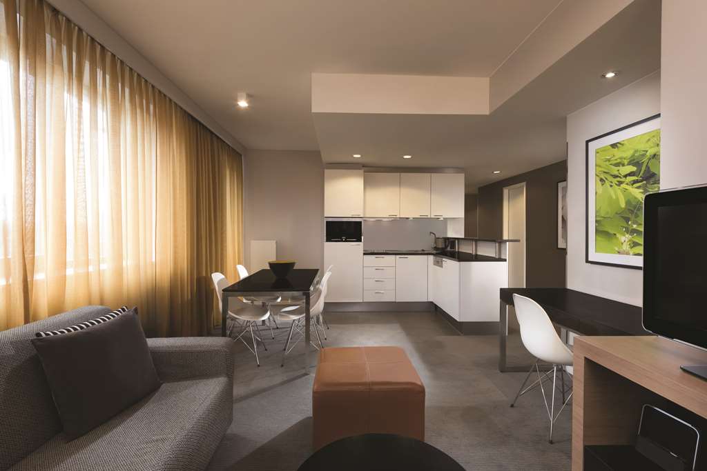 adina apartment hotel berlin mitte two bedroom apartment kitchen and lounge room