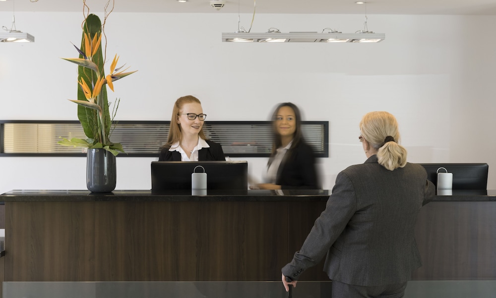 Check-in/check-out kiosk