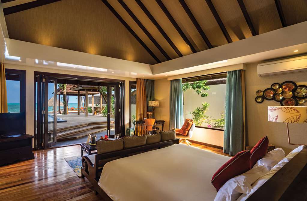 ATMOSPHERE KANIFUSHI MALDIVES VILLAS KANI GRAND BEDROOM VIEW