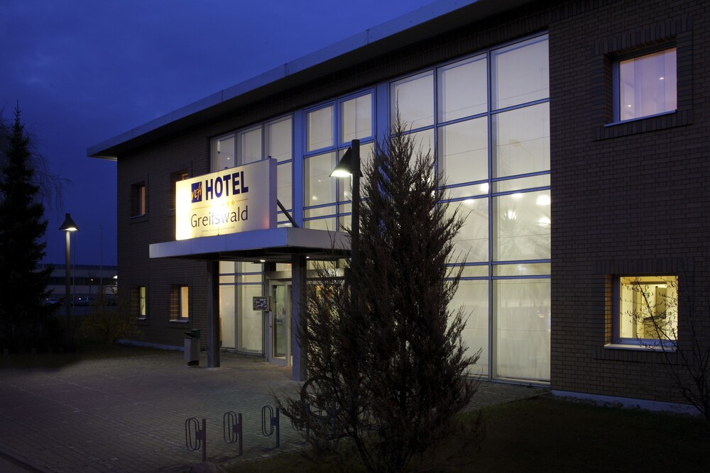 Hotel Front - Evening/Night