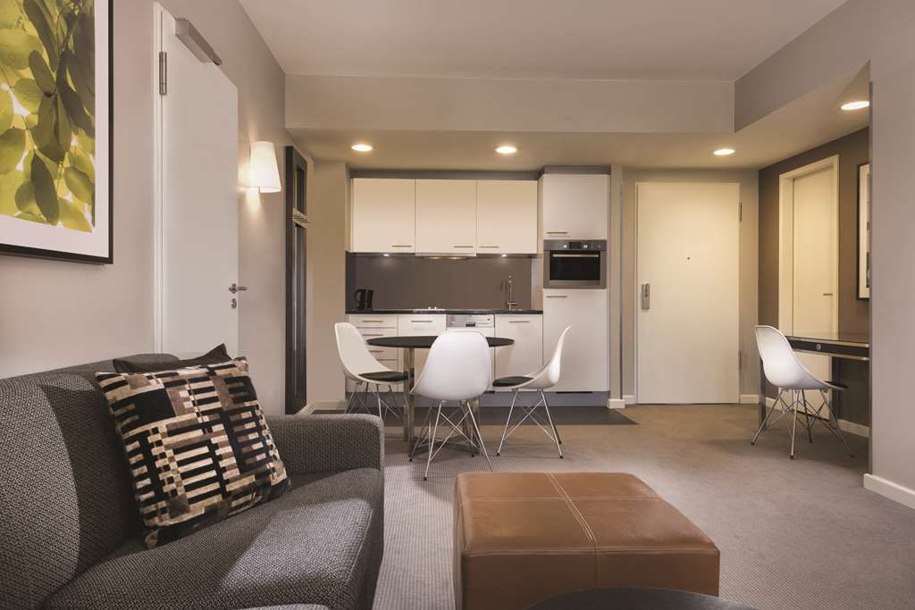 adina apartment hotel hamburg michel one bedroom apartment lounge room and kitchen