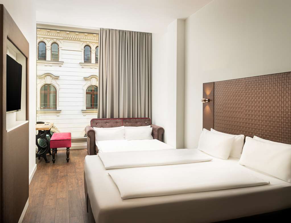 arthotel ana symphonie leipzig standard dreibetzimmer bett