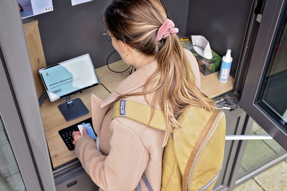 Check-in/check-out kiosk