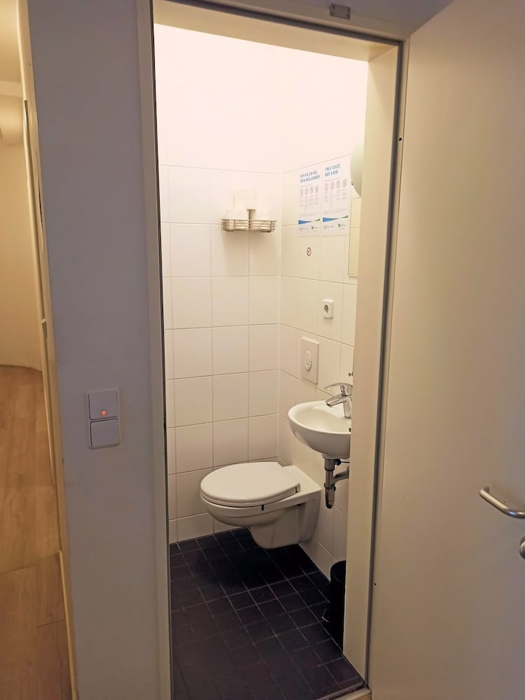 Raised toilet seat