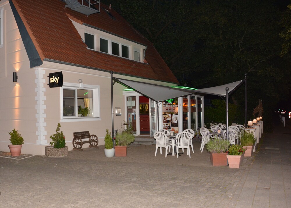 Hotel Front - Evening/Night