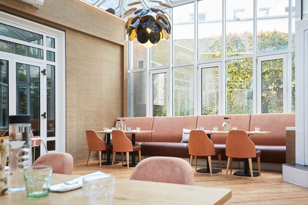 scandic berlin kurfuerstendamm restaurant glass wintergarden water