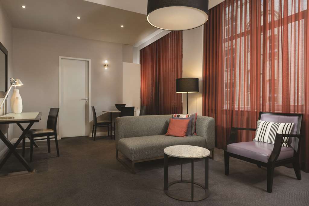 adina apartment hotel berlin checkpoint charlie studio room lounge room