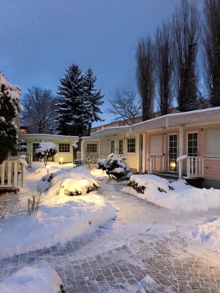 Hotel Front - Evening/Night