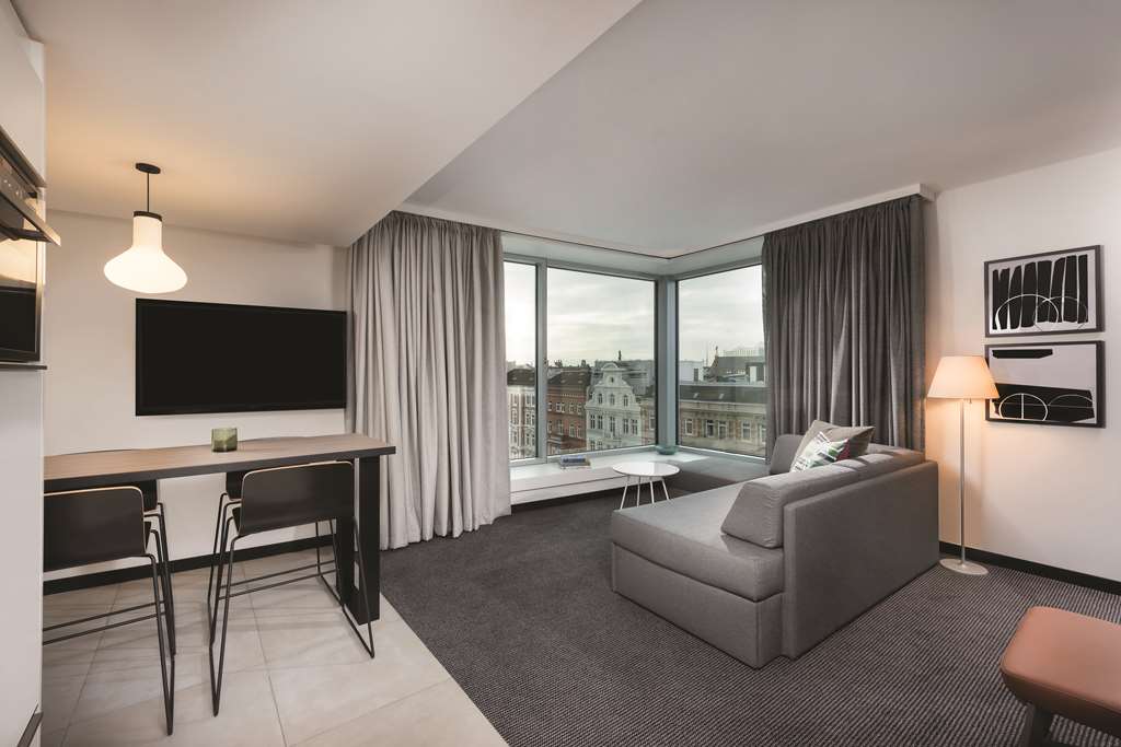 adina apartment hotel hamburg speicherstadt one bedroom lounge room