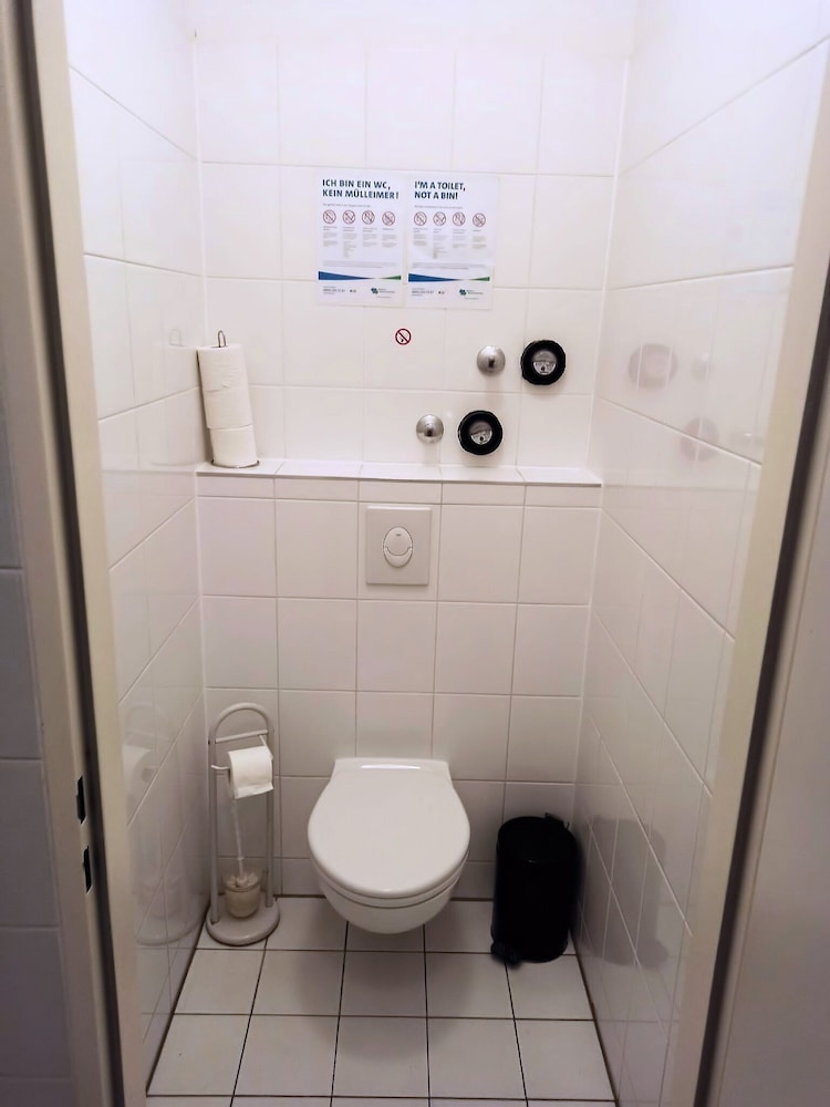 Raised toilet seat