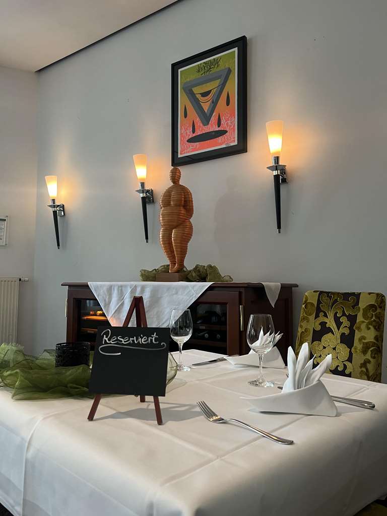 Cozy table in our restaurant “Seven Oceans”