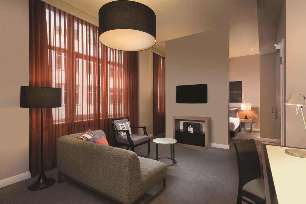 adina apartment hotel berlin checkpoint charlie studio room lounge room